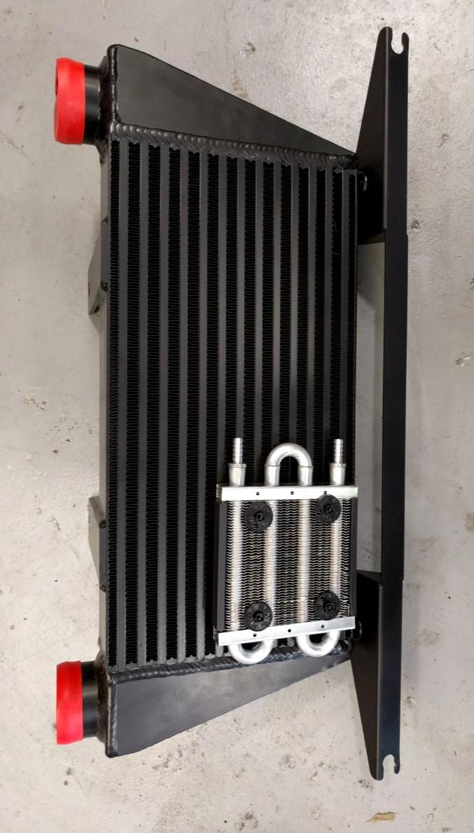 Oil System and Intercooler 1. The Rotrex system has a dedicated oil cooler, this cooler gets installed on the back of the intercooler.