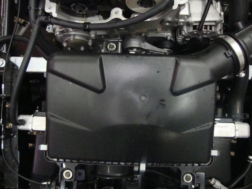 Before pulling the rubber hose off, you will need to disconnect the breather line going to the valve cover and also the intake air temperature sensor.