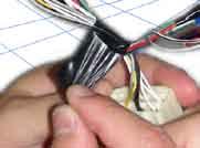 Use a Splicing Connector to secure the V4 Red Wire to the