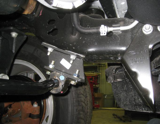 Go back to the front of the vehicle and adjust the sway bar so that the endlinks are as close to straight up and down as you can, once there, torque the swaybar mounting bolts to 42 ft lbs.