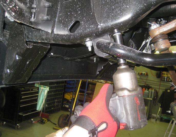 4. Working on the front swaybar, remove the 4 bolts holding it to the