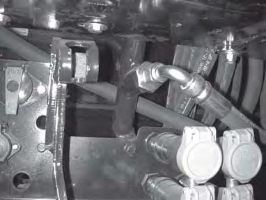 After lines are disconnected, connect the pressure hose to the female fitting and route the hose from the line to the high pressure filter, as shown in the parts section.