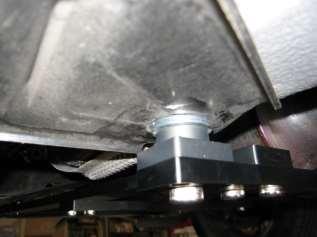 If necessary use heavy flat washers to space the rear of the A-Ladder brace down the and clear the exhaust.
