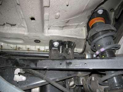 STEP 3 Rear Cross Brace 14. At the rear of the car, locate the rear brace attachment points.