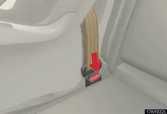 Removing a child restraint installed with a seat belt Push the buckle release button and fully retract the seat belt.