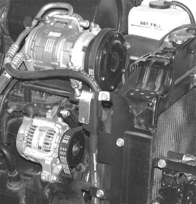 Compressor Belt Check NOTE: Three-cylinder engine shown. Some procedures for the four-cylinder engine are slightly different. See specifics below. 7 NOTE: Air intake tube removed for clarity of photo.
