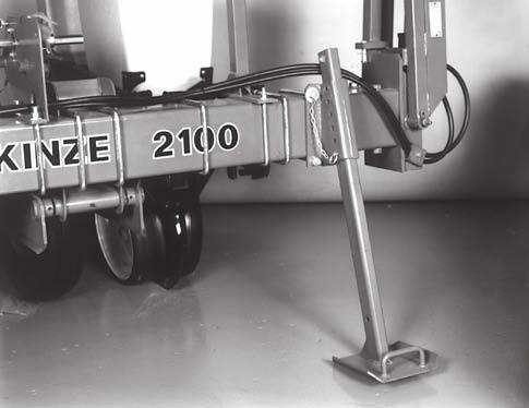 MACHINE OPERATION TOOLBAR HEIGHT ADJUSTMENT 53051-39 PARKING STAND ADJUSTMENT 61048-22 Standard Rear Mounted Drive Wheel 52607-1 Two parking stands, located on the front side of the main frame, are