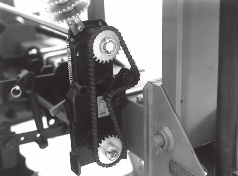 By removing the lynch pins on the hexagon shafts, sprockets can be interchanged with those from the sprocket storage rod bolted to the transmission(s).