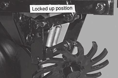 With the wheel mount in the most vertical position, using the rear hole in the upper link, the residue wheel is most aggressive.