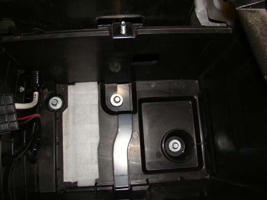 13. Using a 12 mm socket and a ratchet, remove the three (3) bolts at
