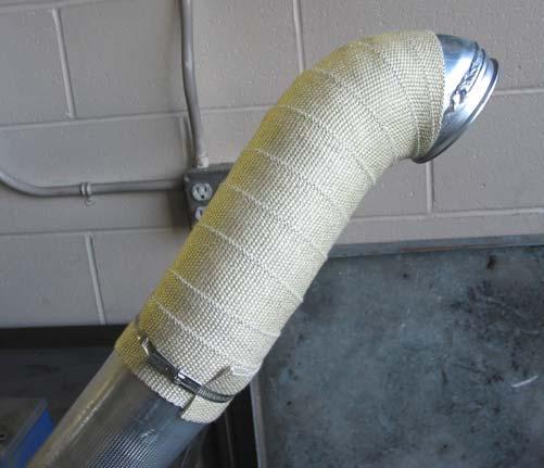 Wrap the down pipe as shown. If you pre-moisten the exhaust wrap it will shrink much tighter.