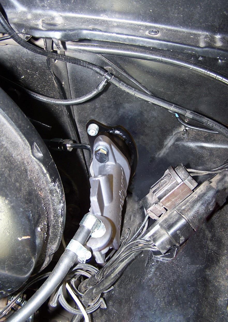 5. Assemble the 90 end of the braided steel pressure line to master cylinder port closest to firewall. 6.
