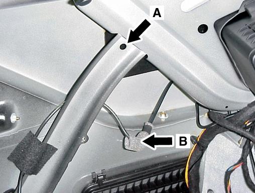 2. 3. In the upper area of the left quarter panel, make sure the hole in the vertical support beam is clear (i.e. nothing wire-tied to it or blocking it) (A, Figure 8).