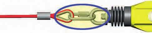 After being fed through the guide hole the rope enters the main housing by going through a feed hole and then is looped back through 180 degrees and is fed through a second feed hole on the opposite