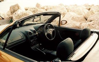 Interior of the 1.8iS, with a Nardi three-spoke steering wheel.