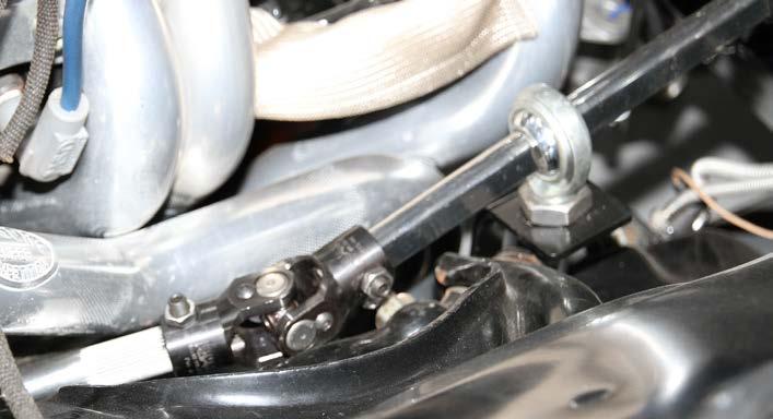 Universal Joint System 1) Install support-bearing mount onto the rear control arm