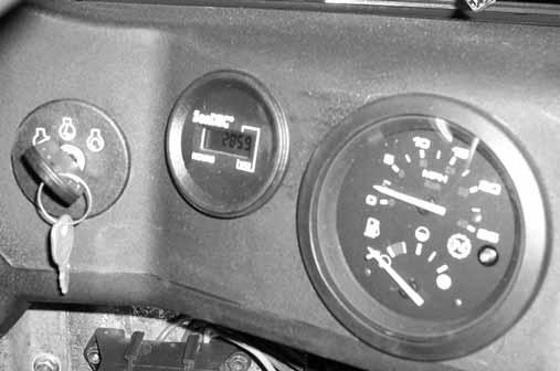Push the switch down to turn the headlights off. Note: The engine ignition switch must be in the RUN position for the headlights to operate.