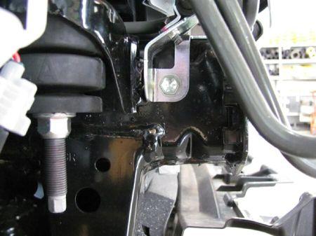 the chassis and the bolt holding the clamp plate.