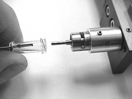 Screw luer lock body onto chosen needle, being sure it is