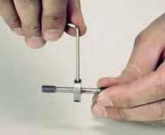 Align the second toolholder by moving it toward the screw.