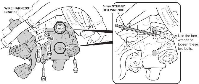 5. Remove the six bolts that attach the steering column gearbox to the steering column.