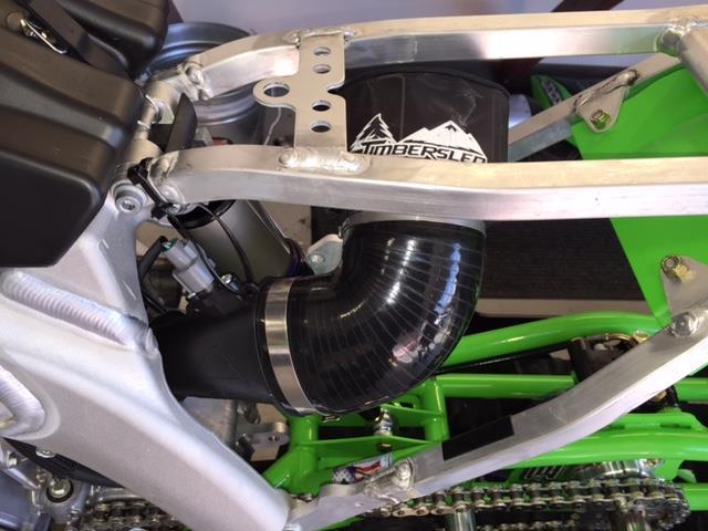 Install intake system so that air filter is located as high as possible and pointing toward the Right-hand side of the bike. To accomplish this each of the rubber hoses has an angle built into them.