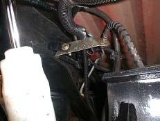 X. Installing the Brake Line Bracket 1. Attach the brake line bracket (G) suppled to the frame using bolt (Z), washer (FF), and nylock nut (EE). Refer to Figure 19. 2.