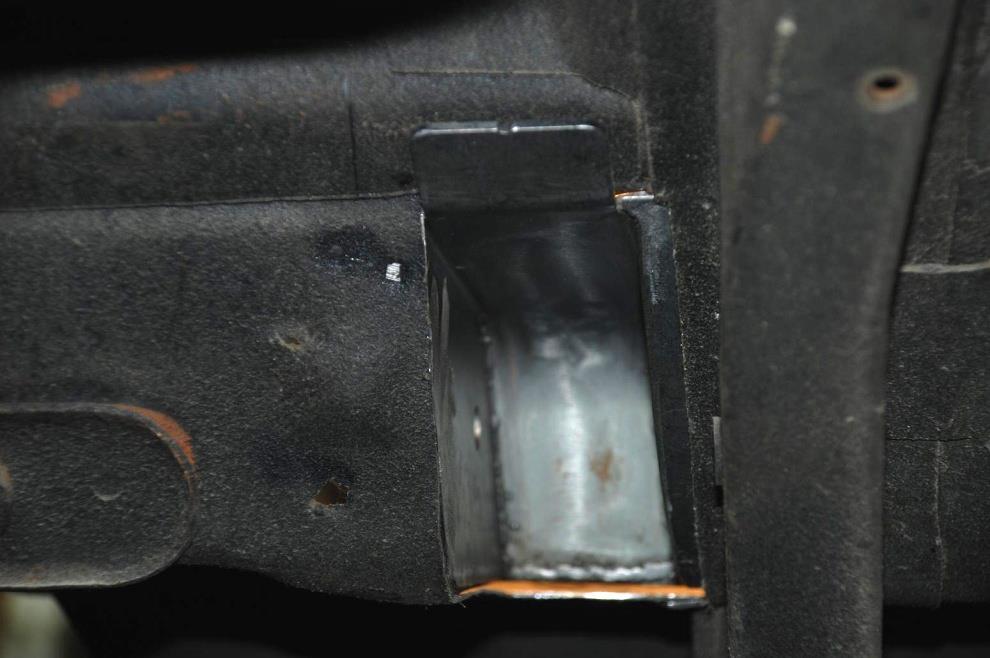 page. The remainder of the pocket flange will sit on the floor inside the vehicle, and the hole will line up with the rear seat belt bolt as illustrated in Figure 10