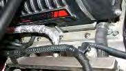 Cover the joint with a rag while loosening the clamp and pulling the hose off. 16. From the passenger s side, pull the fuel hose out from under the supercharger. 17.
