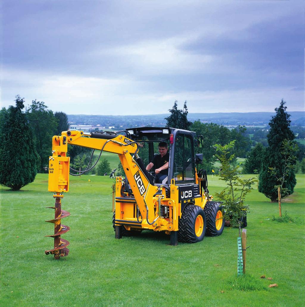 loader is operated via the right-hand, seat-mounted joystick. To operate the excavator auxiliary circuit (eg hammer) the right foot pushes the floor-mounted rocker pedal.