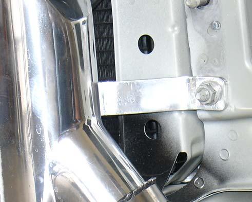 Use the stock m10 flange nut to fasten the passenger side intercooler