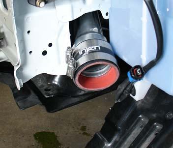 Press the top end into the throttle body hose while aligning the D pipe