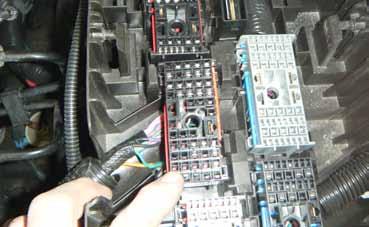 Install the supplied 22 long section of 1/4 high temperature loom to the red wire between the supplied fuse block and