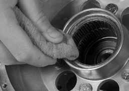 Use a rag to thoroughly clean needle bearings and bearing housing.