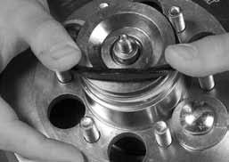 Release the clutch from the carriage bolts and pressurize it several times with