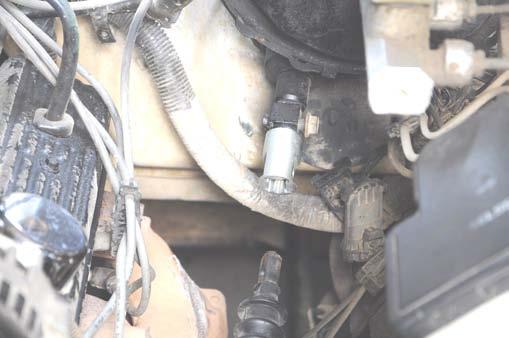47. Install the supplied steering extension, using the factory bolt in the lower steering column.