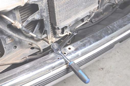 58. Torque the bumper to bracket bolts to 45ft/lbs using a 5/8 socket and wrench.