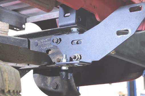 Install center bumper brackets. 24.