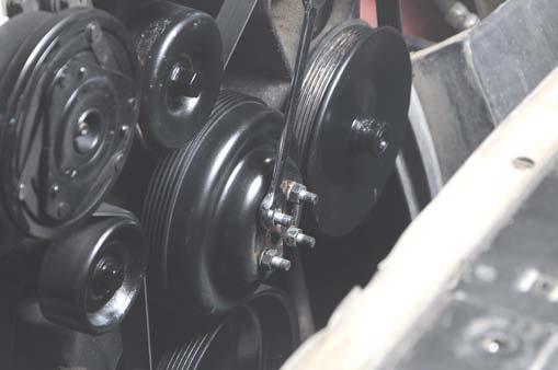 Reinstall the fan clutch nuts back on the studs, to keep the water pump pulley from
