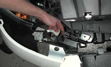8. Remove the eight (8) bolts on the upper radiator support and then remove the upper