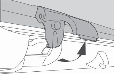 Pull up on the lever and then down and out to release the hook from the loop in the windshield frame.
