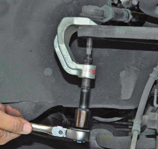 If the vehicle is on a drive-on lift, perform a dry-park check to locate loose ball sockets and worn rack and pinion bushings.