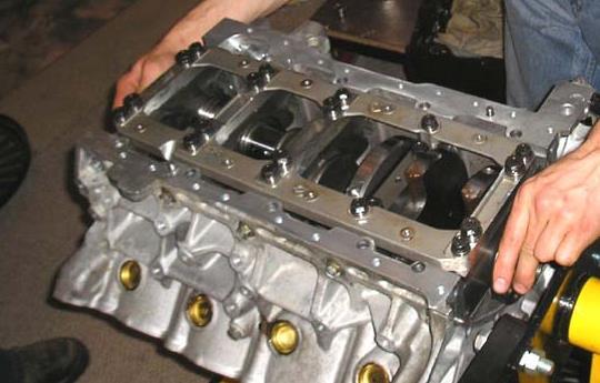 15. High performance engines may have - bolt main bearing caps or be