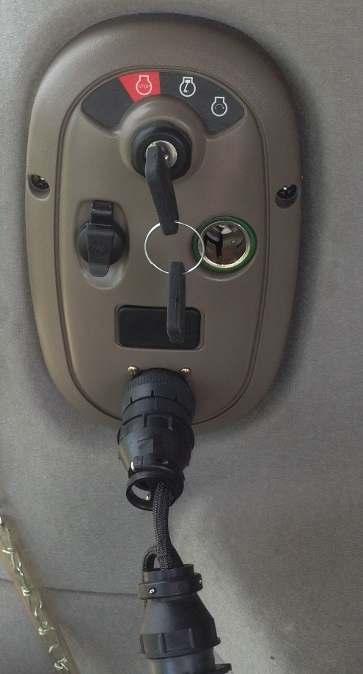 3 Plug in the 9-Pin deutsch connector end of the cab harness into
