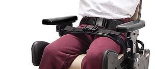 Figure 28a: To attach the thigh belt, unsnap and lift up front of seat pad. Hold metal slide over recessed side of H-slot with belt extending over closest edge and plastic buckle down.