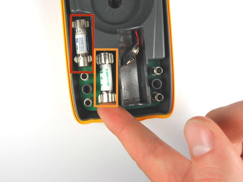 Step 6 Fuse Replace a fuse only with a fuse identical in type, voltage rating, and current rating as specified by the back panel fuse rating label or the Fluke 77 Series III Service Manual.
