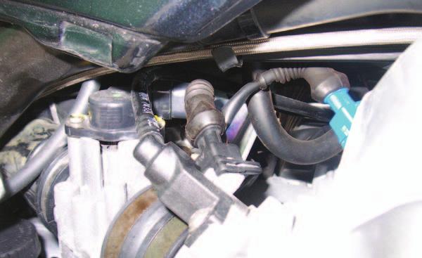FIG.D TPS 6 Unplug the stock wiring harness from the injector (Fig.
