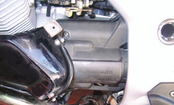 FIG.G 11 Remove the plastic cover on the left hand side of the engine