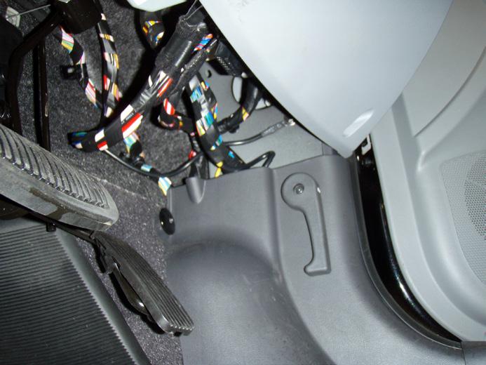 The 20 pin connector is located beside the passenger side strut