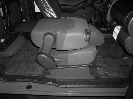 FOLD FLAT FRONT PASSENGER SEAT (if so equipped) To fold the front passenger s seatback flat for extra storage length when transporting long items: Slide the seat to the
